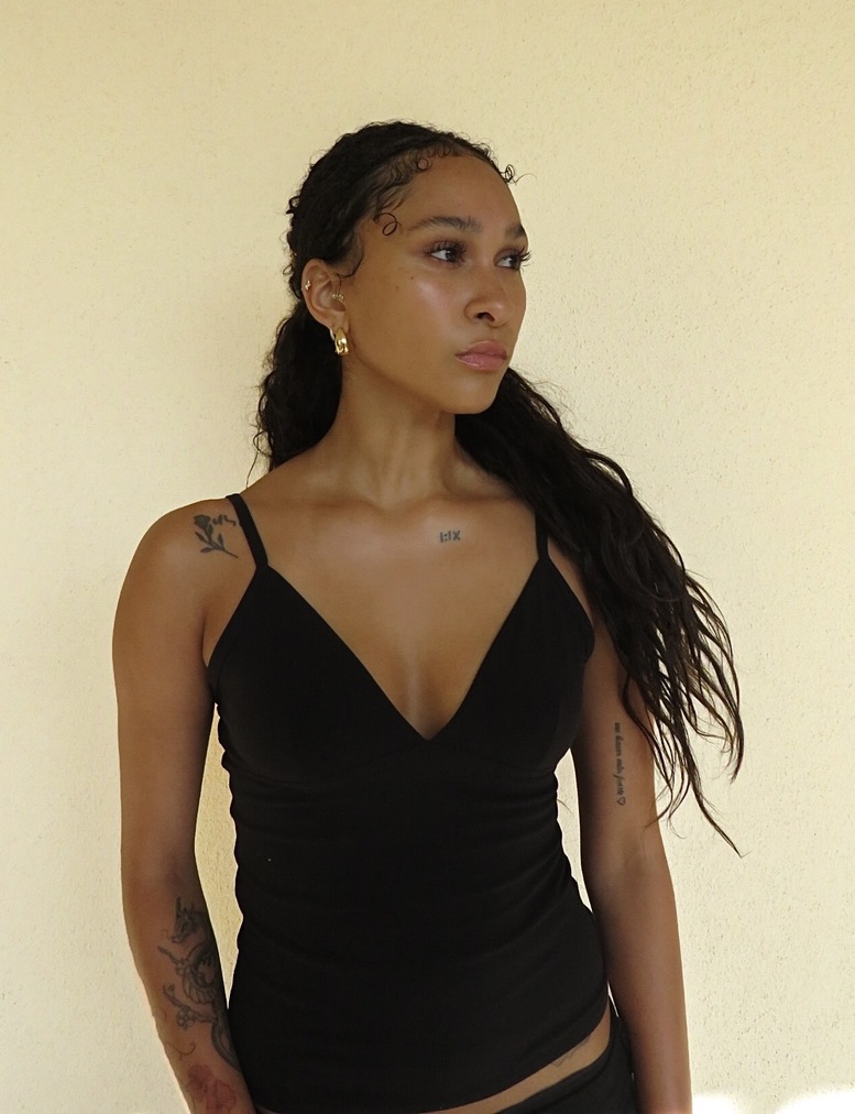 Digital — three-quarter waist-up looking away from camera