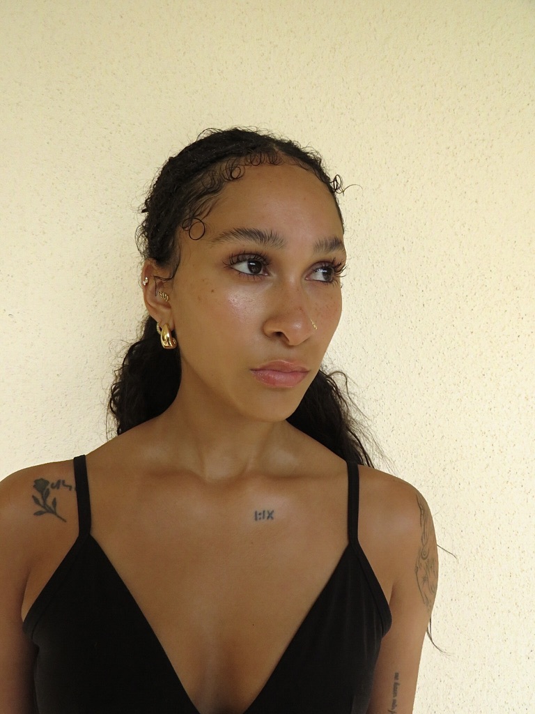 Digital — three-quarter headshot looking away from camera