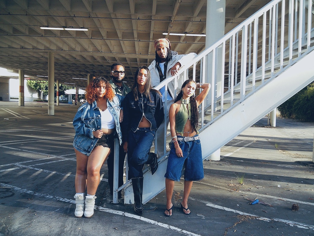 Gap campaign group shot beneath a parking structure stairway